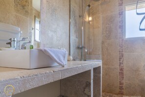Shower, towels, toilet paper