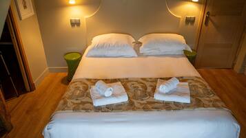 1 slaapkamer, een strijkplank/strijkijzer, wifi, beddengoed