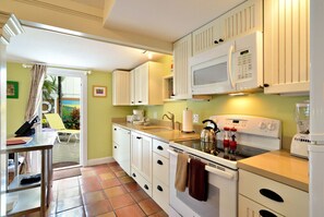 Fridge, microwave, oven, stovetop - Key West Wabi Sabi - Authentic Downtown Cottage w Pool - Steps Off Duval (Key West)