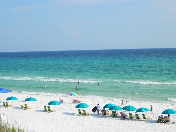 On the beach, sun-loungers