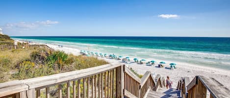 On the beach, sun-loungers