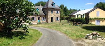 Farmhouse in the woods, on a lake shore