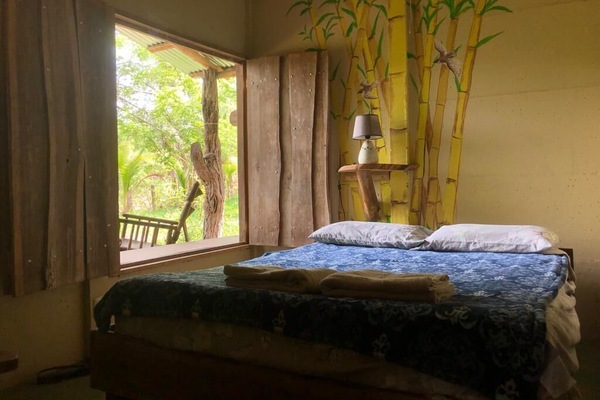 Comfortable double bedroom with stunning views.