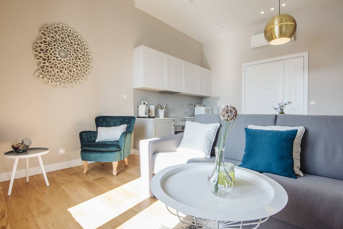 deluxe apartment, 1 king bed with sofa bed, sea view | living area | smart tv, video game console