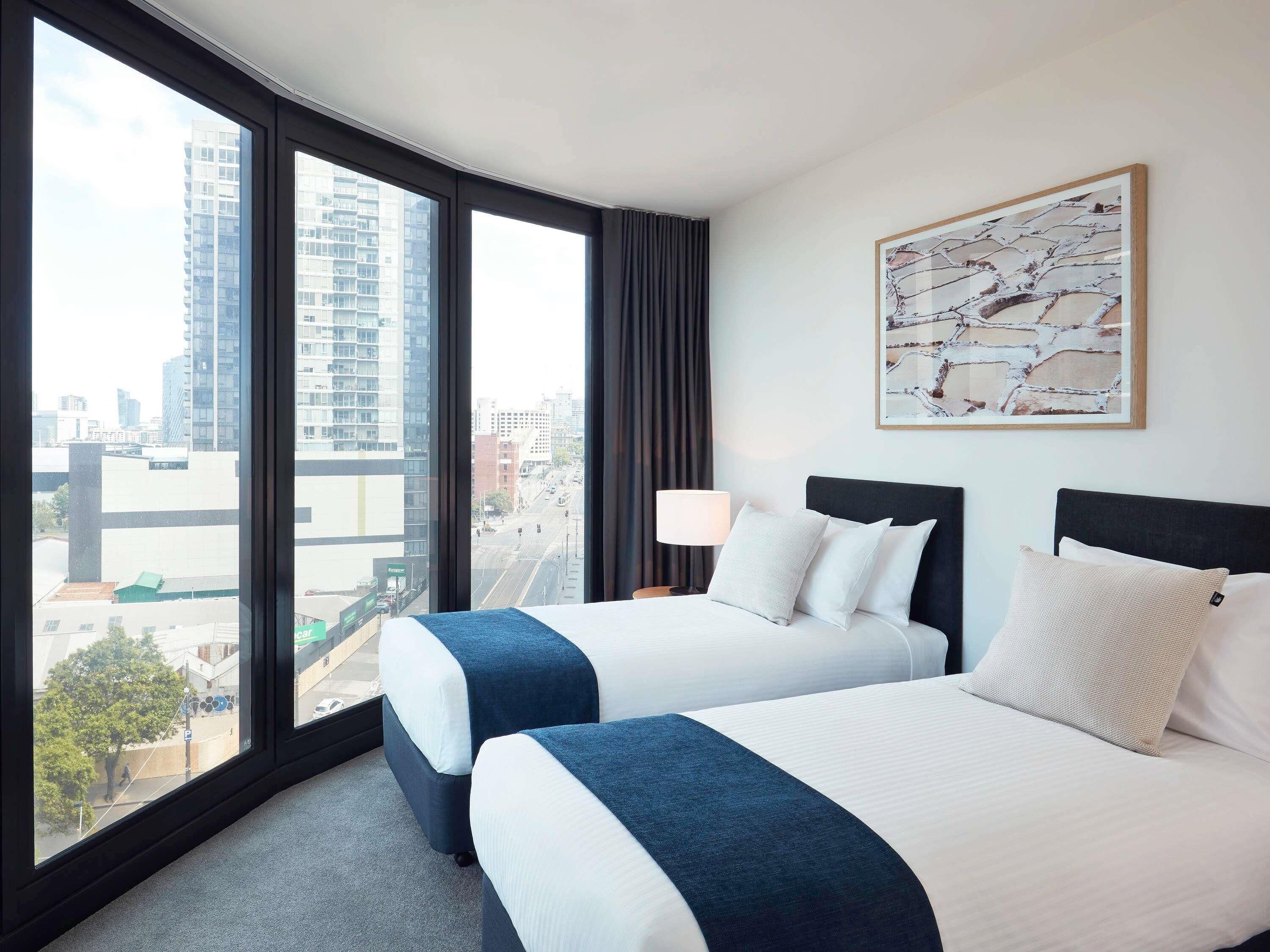 Deluxe Room, 2 Bedrooms, Corner | Desk, laptop workspace, soundproofing, iron/ironing board