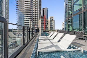 Outdoor pool, pool loungers - Shadow Play by Peppers (Southbank)