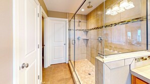 Combined shower/bathtub, hair dryer, towels, soap