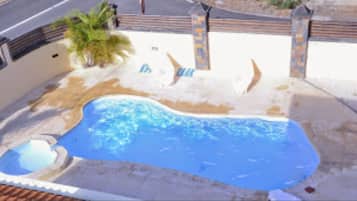 Outdoor pool, pool umbrellas, pool loungers