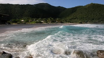 On the beach, sun-loungers, beach towels