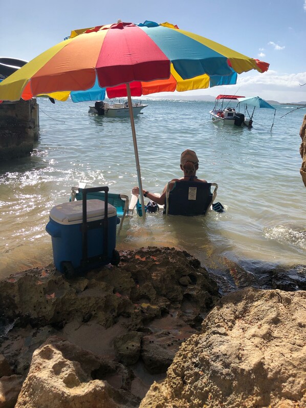 On the beach, sun loungers, beach towels