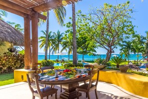 Outdoor dining - LUXURY BEACHFRONT ESTATE 8 BD RANCHOS ESTATES FULLY STAFFED, RESORT ACCESS INCL (Punta Mita)