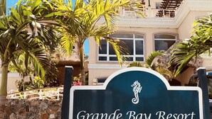 A sign for Grande Bay Resort in St. John. - Grande Bay SURFSIDE Studio, Beachfront, Perfect View/Location (Cruz Bay)