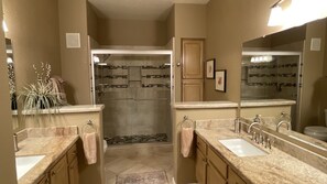 Combined shower/tub, hair dryer, towels, toilet paper