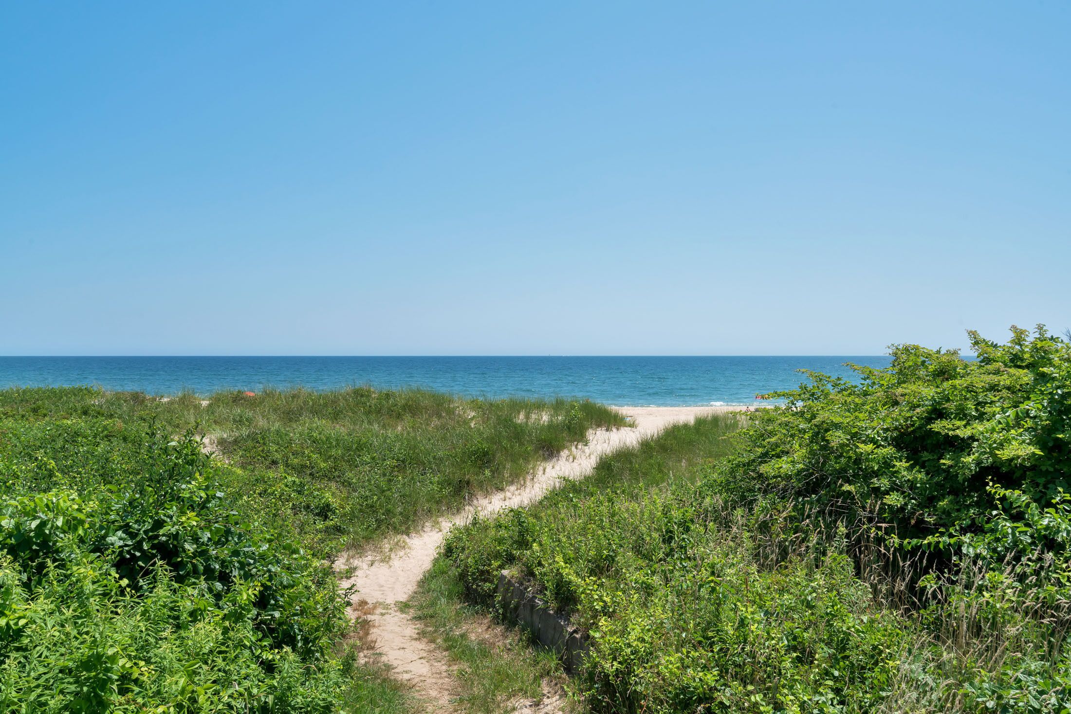 On the beach, sun loungers, beach towels