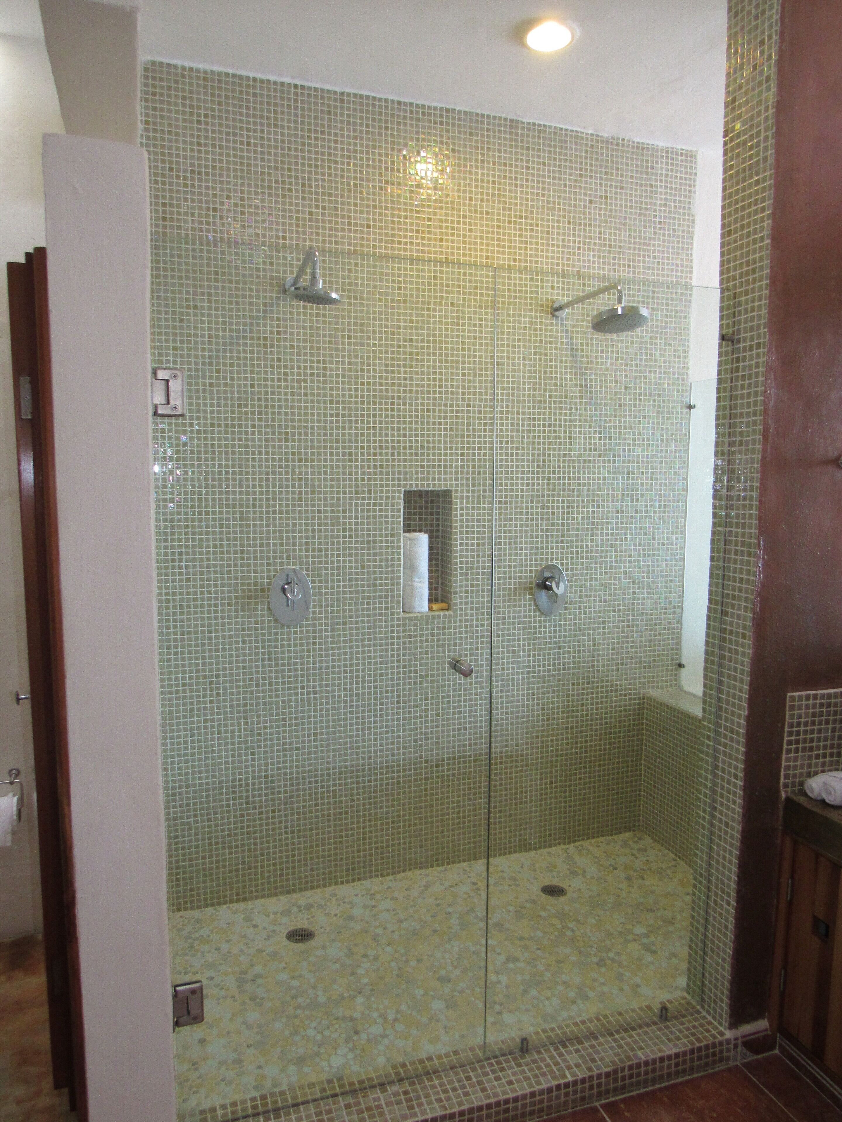 Shower, hair dryer, towels, toilet paper