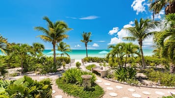 On the beach, sun loungers, beach towels