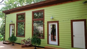 Exterior detail - Pebble Creek Magical Retreat 23 acres Sleeps 17 Log House Large Shelter Deck (Laurel Fork)