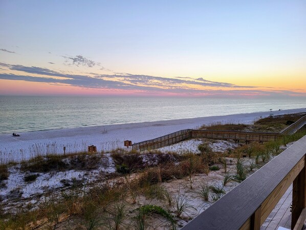 On the beach, sun-loungers