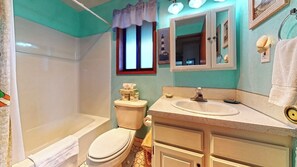 Combined shower/tub, hair dryer, towels, soap