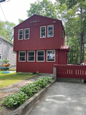 A two-story building with a red exterior, multiple windows, and a nameplate reading 'EPPICH.'