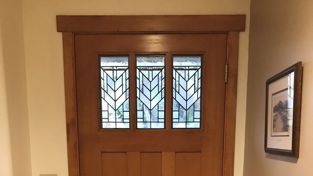 A wooden front door with a glass panel and a small window above it. - Beautiful View Home Alki Beach-West Seattle - 3 bed,3 baths (Seattle)