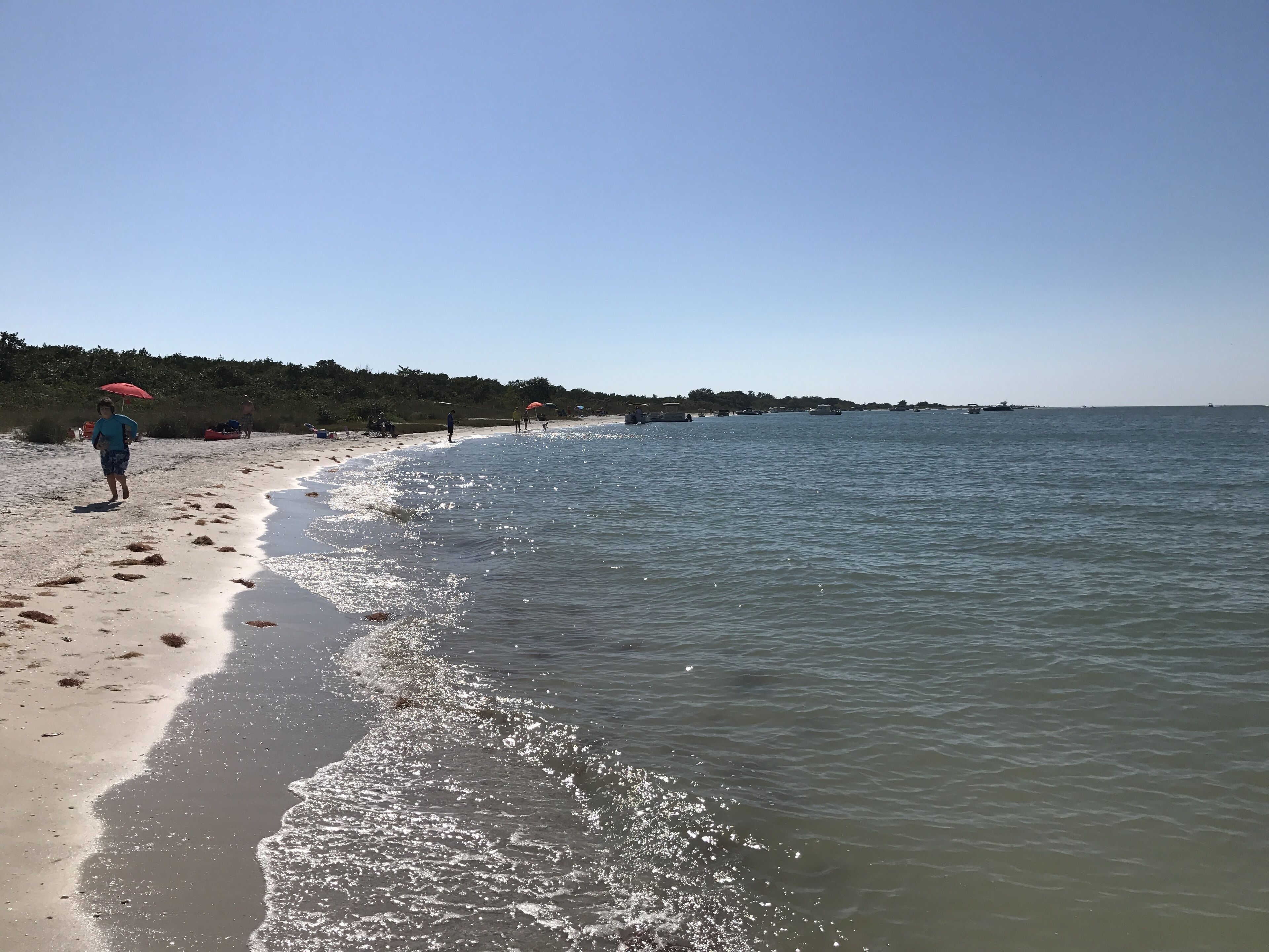 On the beach, sun-loungers, beach towels