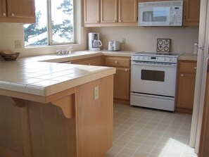 Fridge, microwave, dishwasher, coffee/tea maker