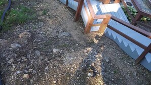A wooden staircase leading down to a dock by a calm body of water. - Pirates Cove 9 Bed/9 Bath,  large hot tub,  private fire pit, double dock  (La Follette)