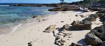 Spectacular Ocean Front Home with a Beautiful Secluded Sandy Beach.