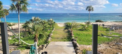 Spectacular Ocean Front Home with a Beautiful Secluded Sandy Beach.
