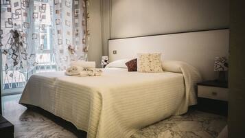 Kamar Triple Klasik | 1 kamar tidur, brankas, meja kerja, dan kedap suara