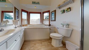 Bathtub, hair dryer, towels, soap