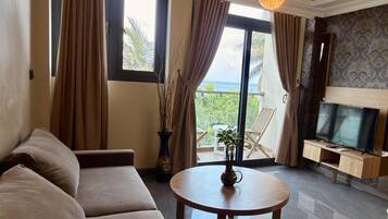 Premium Suite, Balcony, Sea View | Minibar, in-room safe, individually decorated, individually furnished