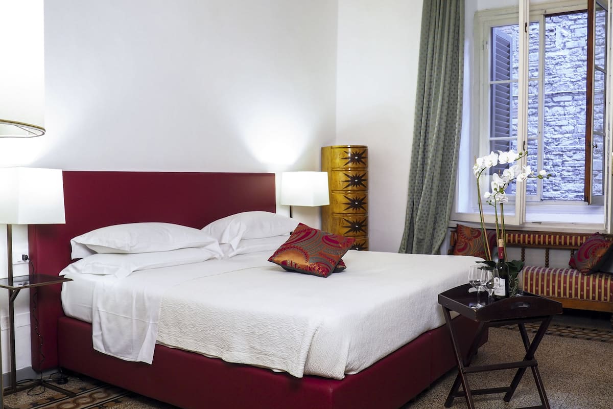 Apartamento clássico | Frigobar, cofres nos quartos, ferros/tábuas de passar roupa