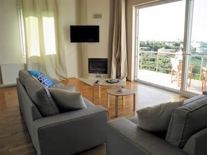 Signature Villa, Multiple Beds, Smoking | Living room | LED TV, fireplace - Villa Dimitra (Chania)