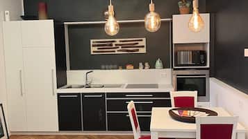 Chambre Quadruple Confort | Cuisine privée