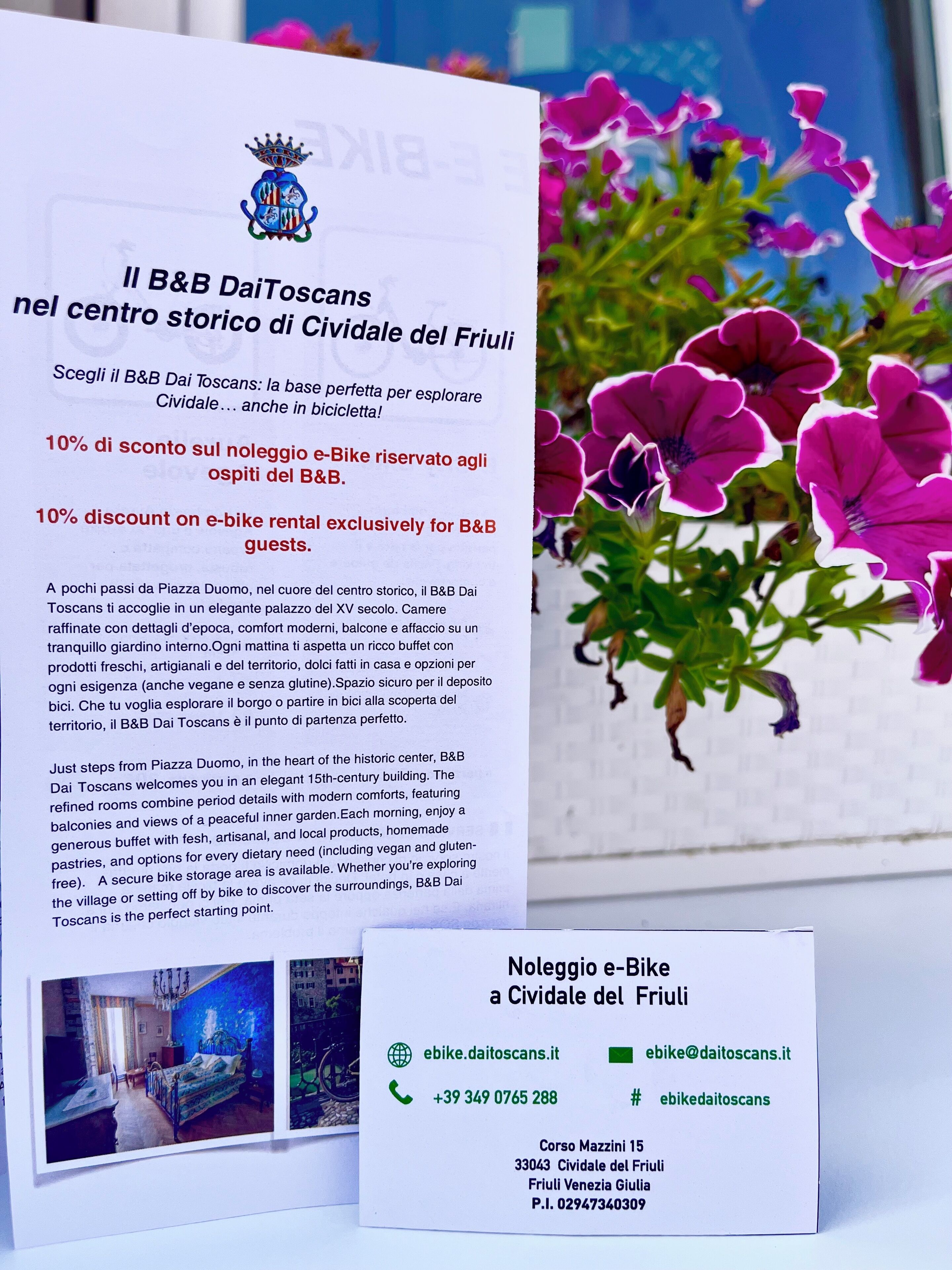 A brochure for B&B DaiToscans with a 10% discount on e-bike rental for guests.