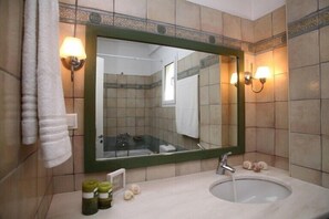 Shower, free toiletries, hair dryer, towels