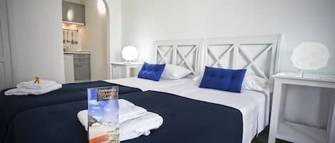 Deluxe Studio, Multiple Beds | In-room safe, desk, blackout drapes, iron/ironing board