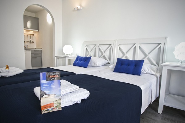 Deluxe Studio, Multiple Beds | In-room safe, desk, blackout drapes, iron/ironing board