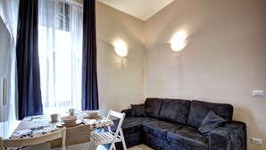 Apartamento, 1 quarto | Área de estar