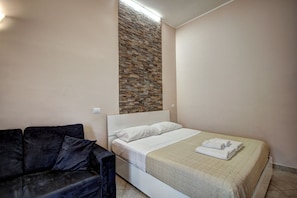 Apartment, 1 Bedroom | 1 bedroom, iron/ironing board, free WiFi, bed sheets