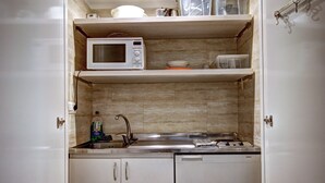 Apartamento, 1 quarto | Cozinha americana privada