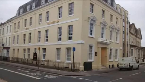 A building with a sign reading "Theatre House." - Homesly Gloucester Hotels Ltd. (Gloucester)