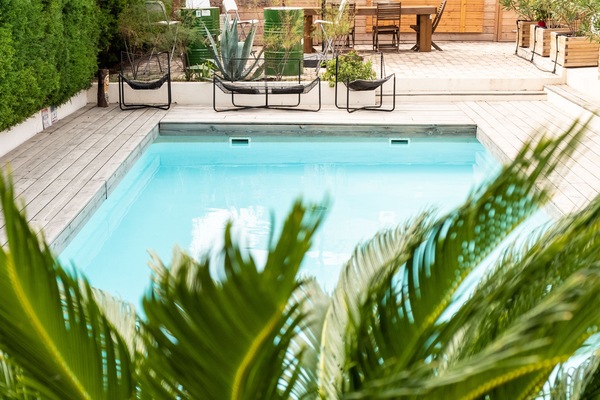 Outdoor pool, open 8:00 AM to 9:00 PM, pool umbrellas, sun loungers