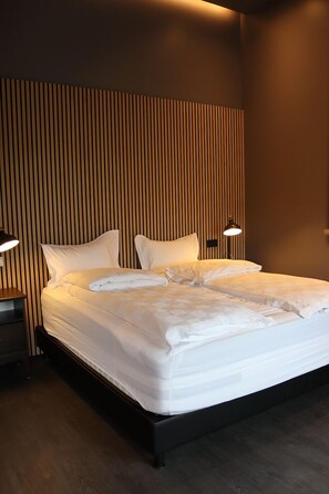 Cortinas blackout, wifi gratis y ropa de cama 