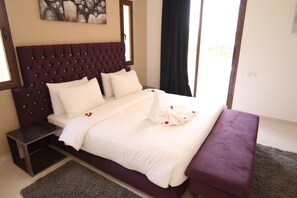 Villa, 4 Bedrooms | Desk, blackout curtains, free WiFi, bed sheets
