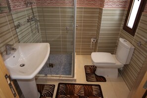 Villa, 4 Bedrooms | Bathroom | Deep-soaking bathtub, rainfall showerhead, bathrobes, slippers