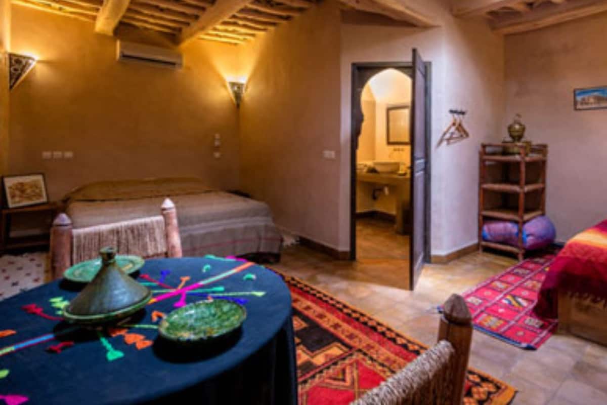 Standard Triple Room (Boughanim) | In-room safe, blackout drapes, free WiFi, bed sheets