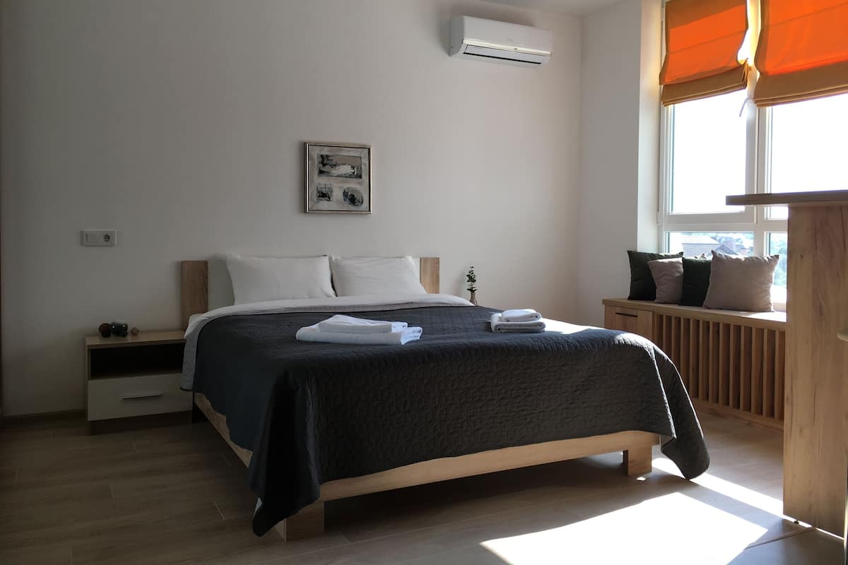 Premium bedding, Select Comfort beds, desk, blackout drapes